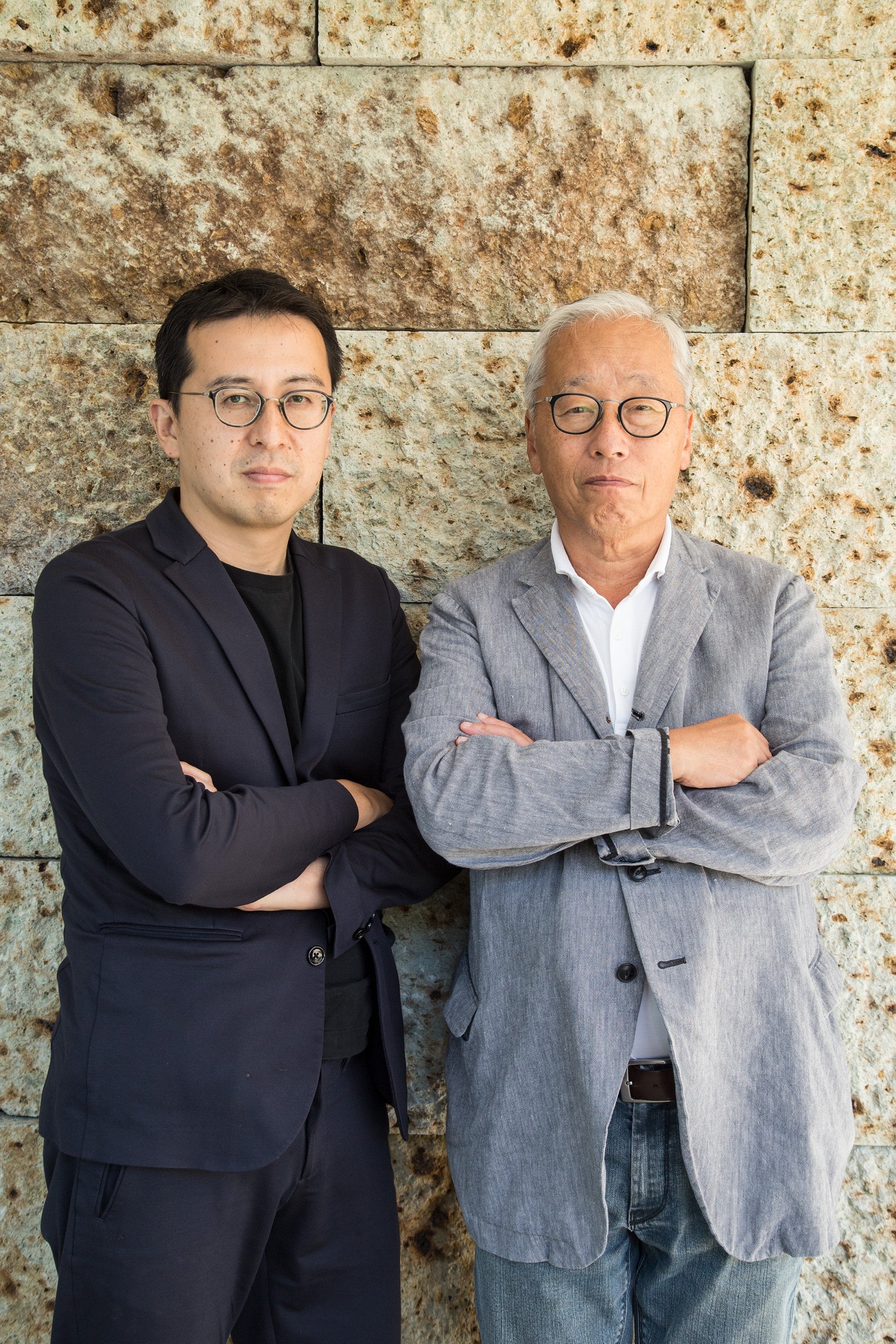 Hiroshi Sugimoto (Right) and Tomoyuki Sakakida (Left). The wall stone behind the two is the Oya Stone from Enoura Observatory.