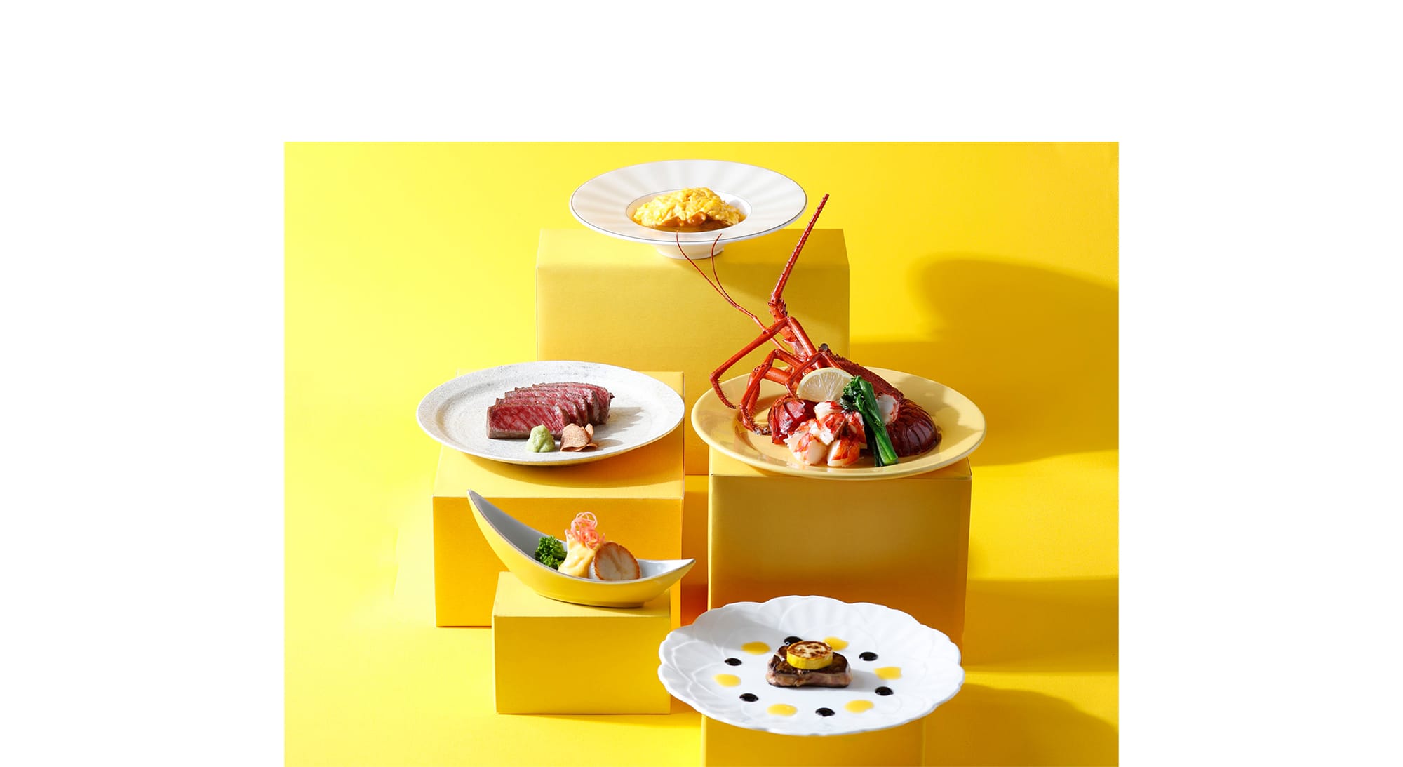 鉄板焼「恵比寿」では黄色をアクセントにしたHappy Yellow鉄板焼コースを用意。（¥20,000　消費税・サービス料別）